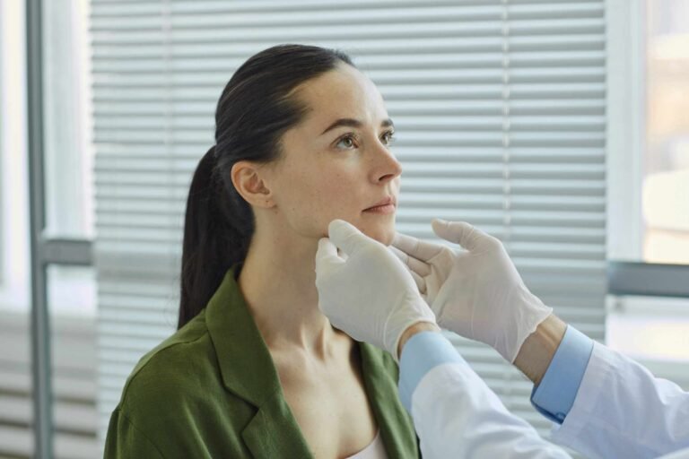 unrecognizable-doctor-examining-female-patient-EEVB3U4.jpg