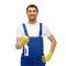 profession, cleaning service and people concept - happy smiling male worker or cleaner in overall and gloves with detergent over white background